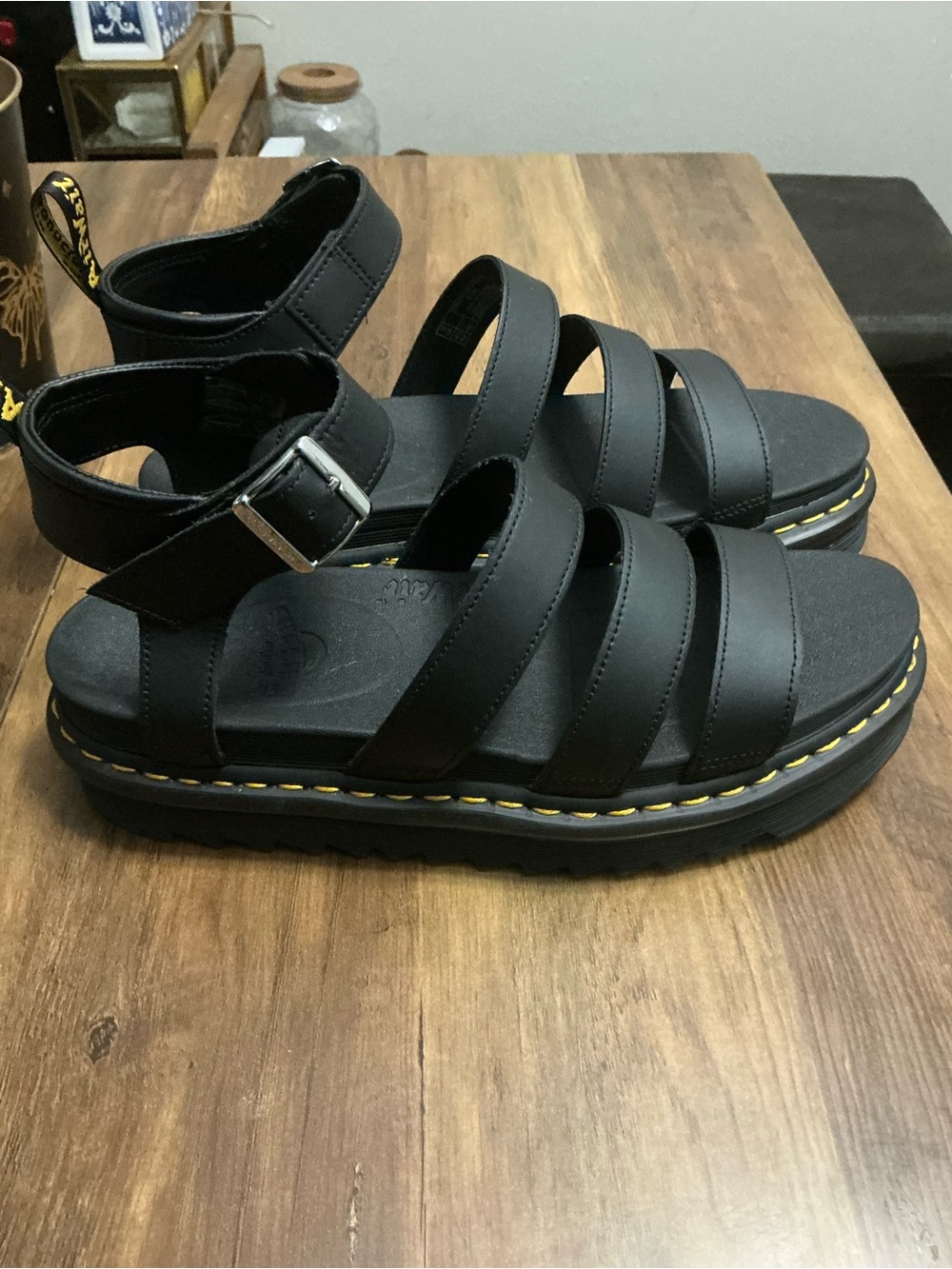 Dr. Martens Black Leather Triple-Strap Sandals with Yellow Stitching